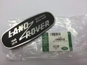 NAME PLATE FRONT - LAND ROVER - OVAL METAL - BLACK SURROUND - BLACK METAL GRILLE - DEFENDER 2007 ON